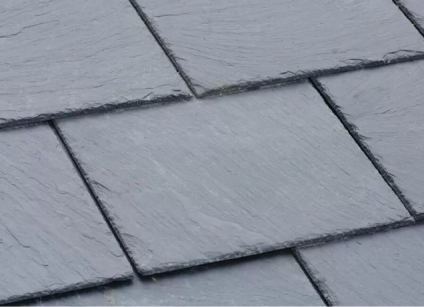 a close-up of of a grey composite aka synthetic slate roofing product